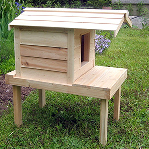 Outdoor Cat House with Lounging Deck and Extended Roof